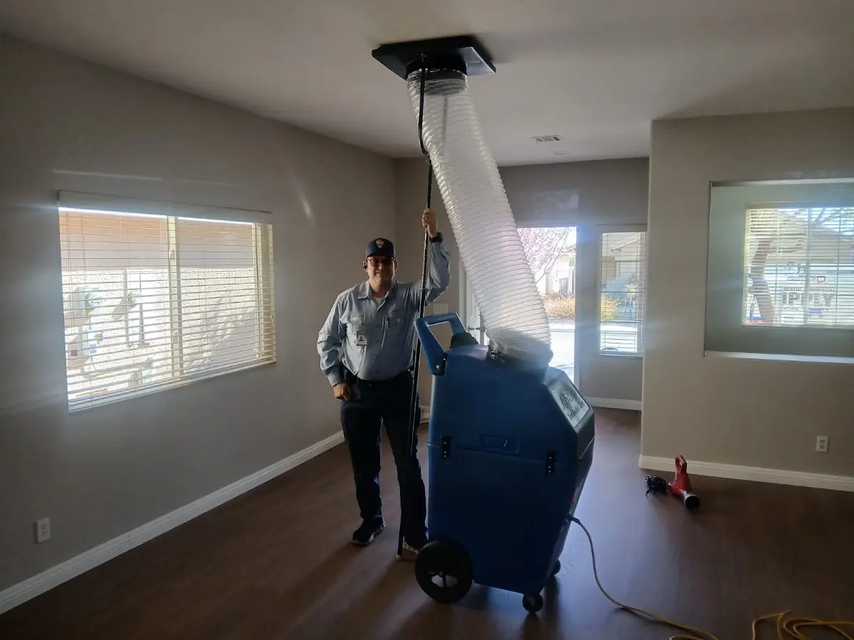 Professional Dryer Vent Cleaning work inside a Beverly Hills home